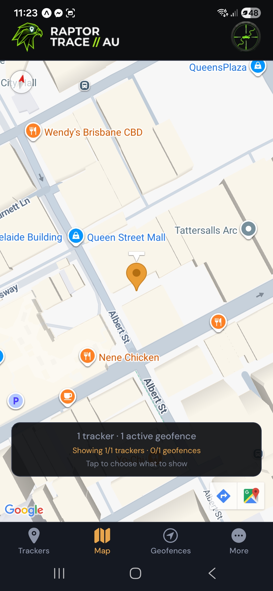 Full-screen map with an orange vehicle pin and a summary chip for trackers and geofences on the map.